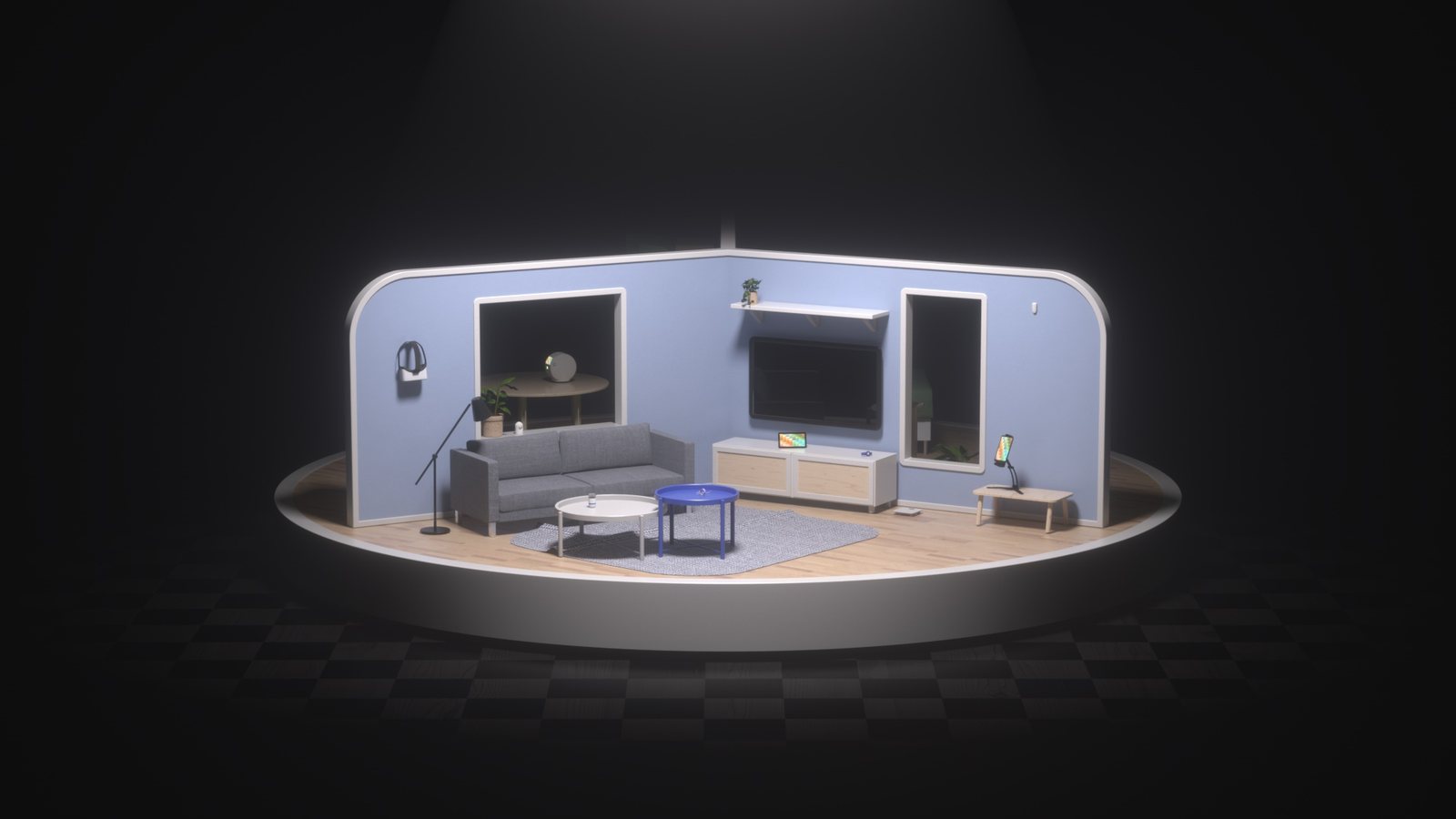 A blue living room with a sofa, television, tablet on a stand and a floor scale, on the same circular stage, lit from above with darkness around it.